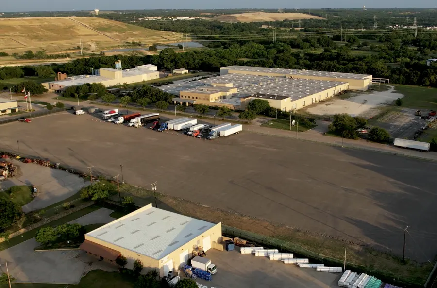Aerial daytime view of the Fort Worth Longhorn Truck Parking lot with trailers parked